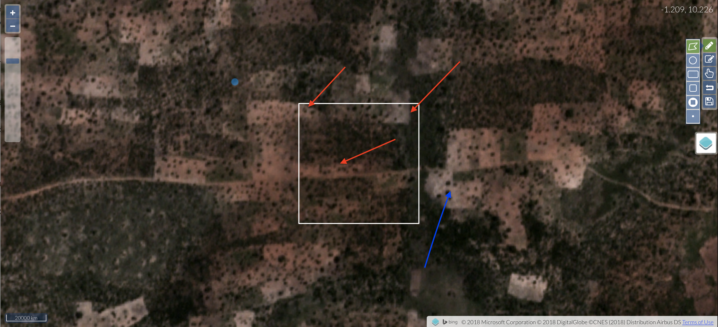 Planet growing season true color. The red arrows show locations where mappable crop fields exist, but don't appear in the underlying basemap image below. The blue arrow shows field expansion in the Planet image relative to the basemap below, but in this case these fields would not be mapped because they do not overlap our labelling target