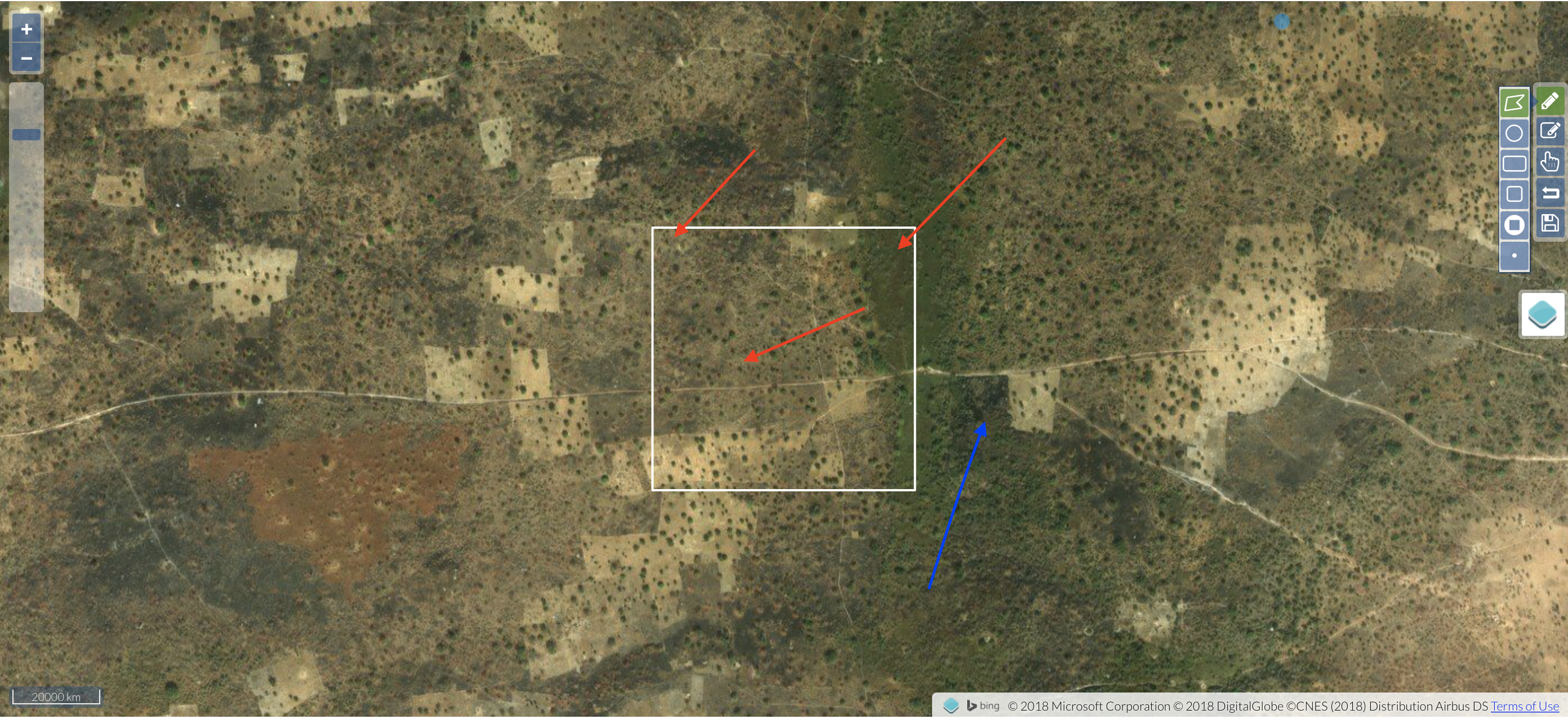 Basemap image, with red and blue arrows pointing to places where fields exist within the Planet image above, but not in the basemap 